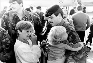 Images Dated 1st January 1982: WIFE OF BRITISH SERVICEMAN WIPES AWAY THE TEARS DURING FAMILY REUNION BACK FROM THE