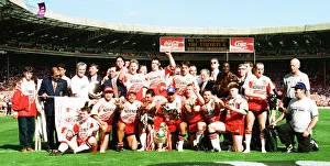 Team Prints: Wigan pose for a team picture after winning their seventh sucessive Rugby League Cup