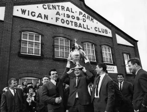 Wigan Rugby F. C. return. The triumphant Wigan Rugby Team parade outside their ground