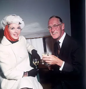 Wilfred Brambel actor with Katie Boyle at Variety Club Christmas Lunch