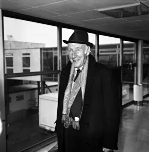 Wilfred Hyde-White arrived at Heathrow Airport from Los Angeles