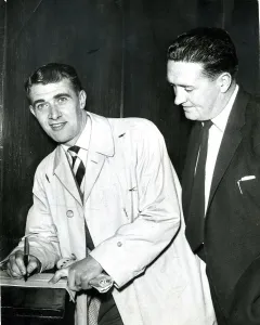 00565 Prints: willie cunningham signs on for dunfermiline watched by manager jock stein sport football