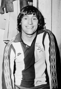 00432 Prints: Willie Johnston of West Bromwich Albion smiling after a match Evaluation