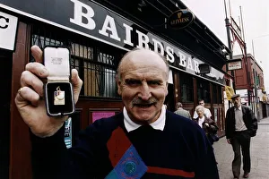 Willie O Neill ex Celtic player holding the European Cup Medal he won playing as one