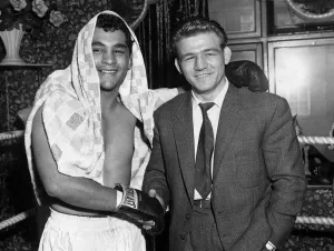 Willie Pastrano with Johnny Sullivan whose license was recently taken away from him by