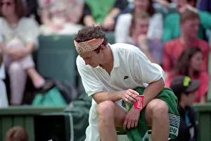 Wimbledon Tennis. John McEnroe (With Eric Crapton Watching). July 1991 91-4197-004