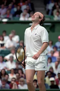 Wimbledon Tennis. Stefan Edberg beats John McEnroe who looks unhappy