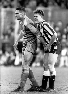 Core61 Prints: Wimbledons Vinnie Jones gets to grips with Newcastle United footballer Paul