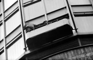 Two window-cleaners working in a cradle up the Post Office Tower this morning had a cold