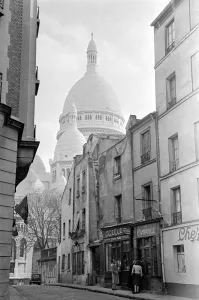 00202 Prints: Window shopping in the cobbled streets behind Scare Coeur Paris France 1951