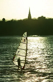 Sunshine Prints: A windsurfer enjoys the sunshine despite the freezing temperatures on Edgbaston Reservoir