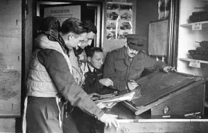 A wing commander briefs his pilots in the new speedier ways which are needed to fight in