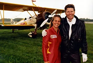 Aerobatics Prints: Wing walker, Tanya Gaze, and pilot Mike Dentith pictured with the Cadbury