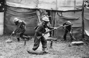 01433 Prints: The winning team clearing up enemy headquarters during an inter-team competition held