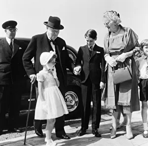 00719 Prints: Winston Churchill attending the christening of Rupert Soames. 20th July 1959