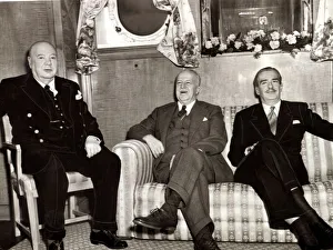 Winston Churchill in his cabin aboard The Queen Mary with The American Ambassador Walter