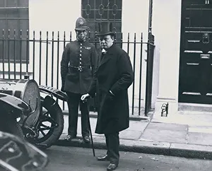 Police Officer Prints: Winston Churchill outside number number 11 Downing Street during the Railway strike