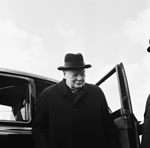 Winston Churchill pictured at London airport before his flight to the United States of