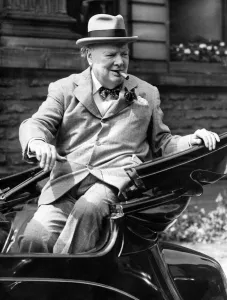 Cigar Prints: Winston Churchill smiles at the cheering crowds as he leaves the Town Hall on his visit