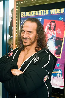 00864 Prints: Wolf from Gladiators opening the new Blockbuster Video in Reading. 6th November 1994