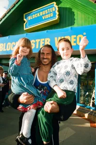 Wolf from Gladiators opening the new Blockbuster Video in Reading. 6th November 1994