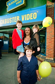 Wolf from Gladiators opening the new Blockbuster Video in Reading. 6th November 1994