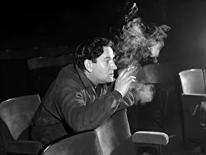 00089 Prints: Wolf Mankowitz sitting in the stalls watching rehearsals for his musical