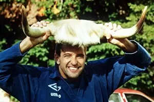 Images Dated 17th October 1990: Wolverhampton Wanderers footbaler Steve Bull football holding up a pair of cow horns to