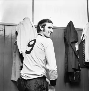 Wolverhampton Wanderers footballer Derek Dougan pictured in dressing room