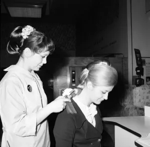 Woman at the beauty department of Selfridges store having a Tovar- tress attached to her
