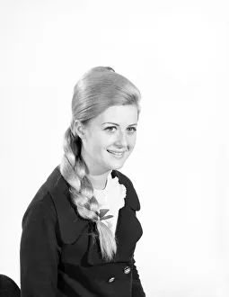Hair Styles Prints: Woman at the beauty department of Selfridges store having a Tovar- tress attached to her