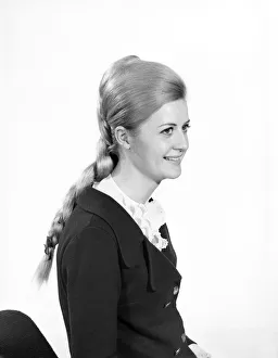 Woman at the beauty department of Selfridges store having a Tovar- tress attached to her