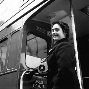 Bus Conductor Prints: Woman Bus Conductor by Red Double Decker Buses - 1960