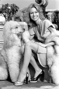 Woman and dog. Suzanna Leigh at todays photo session with her poodle Natashia