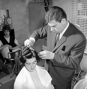 Woman have her hair cut and curled at the hair dressers, 7th June 1962