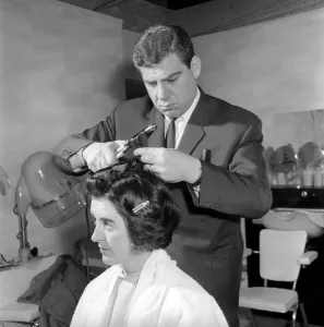 00845 Prints: Woman have her hair cut and curled at the hair dressers, 7th June 1962