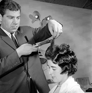 00845 Prints: Woman have her hair cut and curled at the hair dressers, 7th June 1962