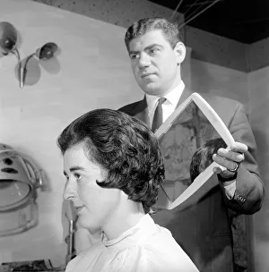 00845 Prints: Woman have her hair cut and curled at the hair dressers, 7th June 1962