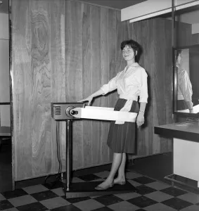 Woman at the John London Hair and Beauty Saloon seen here using a band vibrating slimming
