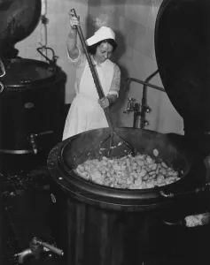 00369 Prints: A woman mashing potatoes to feed the poor in Liverpool, Labour