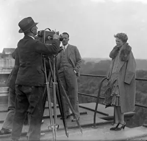 1928 Prints: Woman pilot Amelia Earhart poses for the news cine camera on the roof of the Dorchester