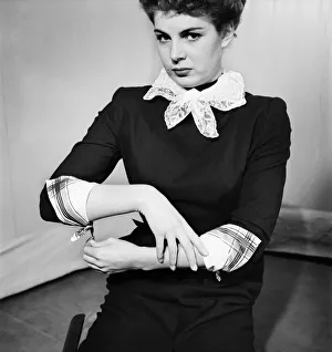 00026 Prints: Woman poses wearing a neck scarf and handkerchiefs as cuffs
