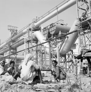 Heavy Industry Prints: Woman seen here making tea for the workers at the Durgapur steel works in West Bengal