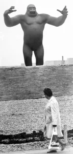 Scary Prints: A Woman takes a passing glance at the King Kong statue in Birmingham, September 1972