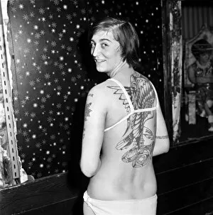 00032 Collection: Woman with tattoos posing at her home showing off her body art