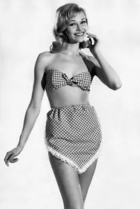 Checked Prints: Woman wearing a check patterned bikini with unusual pants June 1962 P011070