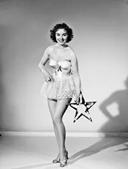 Woman wearing Christmas fairy fancy dress. 1959