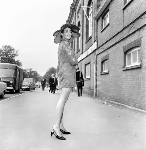 00044 Prints: Woman wearing mini dress with large hat on the first day of Royal Ascot June 1970