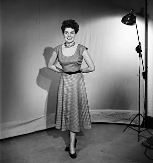 00026 Prints: Woman wearing a pinafore dress November 1952 C6272-002