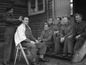 Women of the ATS who are operate the height finder optics at an anti aircraft battery in